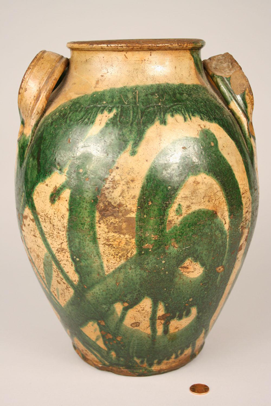 This 19th-century redware jar, made in the workshop of East Tennessee potter Christopher Haun, will be offered in the Oct. 16 sale at Case Auctions in Knoxville. Dramatic streaks of green copper oxide decorate the curve of the body. Image courtesy Case Auctions, Knoxville, Tenn.